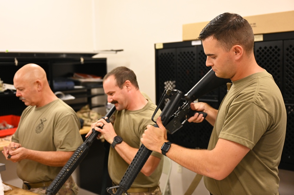 CATM Personnel clean weapons at Goldwater ANG Base