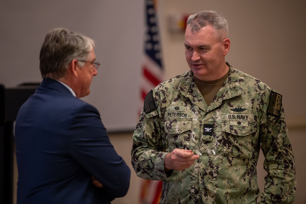 Team Charleston welcomes 18 new honorary commanders, presents public service award to local community leader