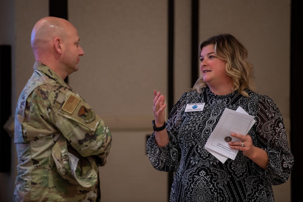 Team Charleston welcomes 18 new honorary commanders, presents public service award to local community leader