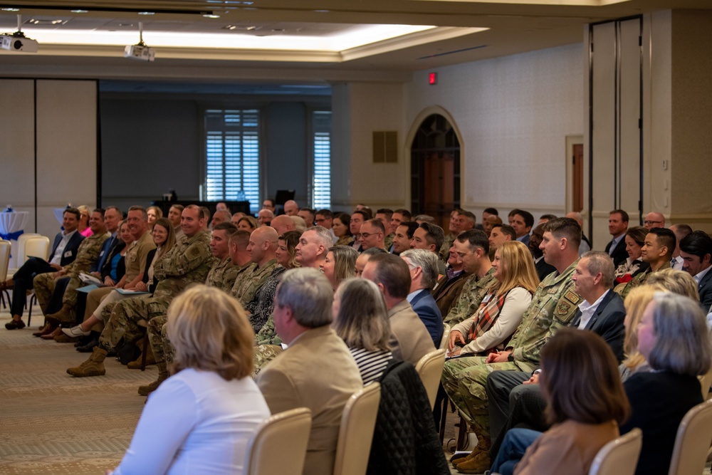 Team Charleston welcomes 18 new honorary commanders, presents public service award to local community leader