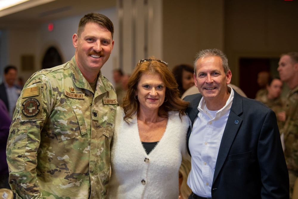 Team Charleston welcomes 18 new honorary commanders, presents public service award to local community leader