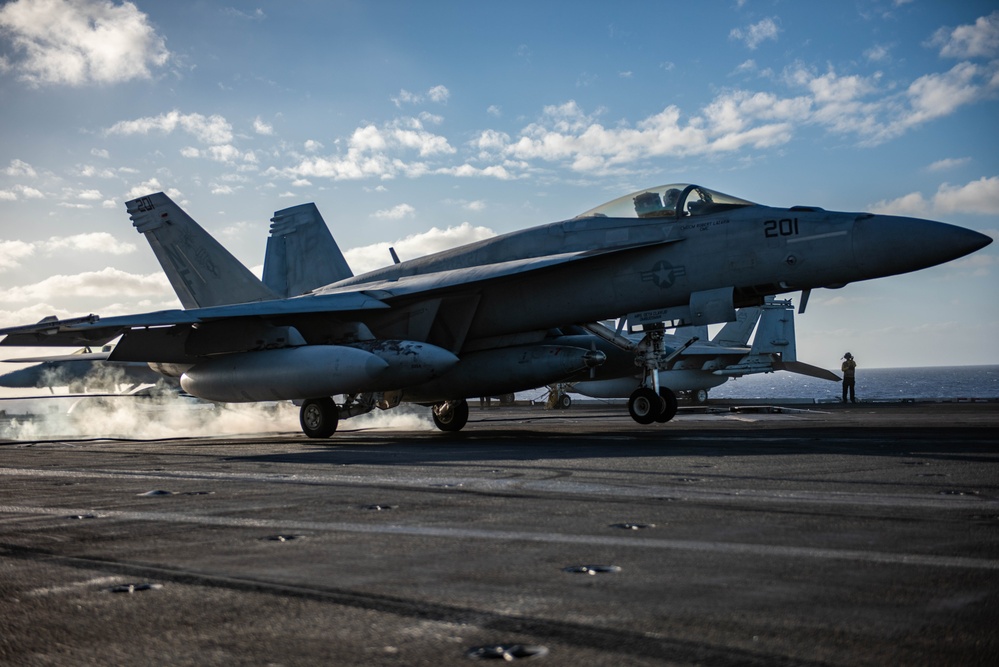 USS Ronald Reagan (CVN 76) conducts flight operations in support of Multi-Large Deck Exercise with USS Carl Vinson (CVN 70) and Japanese Maritime Self-Defense Force Hyuga-class helicopter destroyer JS Hyuga (DDH 181)