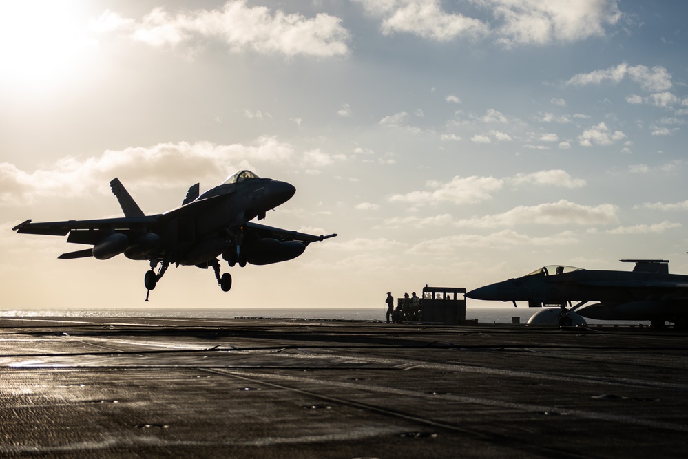 USS Ronald Reagan (CVN 76) conducts flight operations in support of Multi-Large Deck Exercise with USS Carl Vinson (CVN 70) and Japanese Maritime Self-Defense Force Hyuga-class helicopter destroyer JS Hyuga (DDH 181)