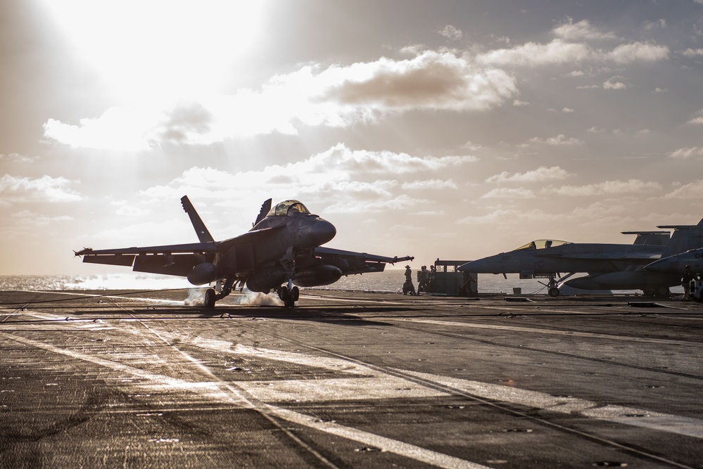 USS Ronald Reagan (CVN 76) conducts flight operations in support of Multi-Large Deck Exercise with USS Carl Vinson (CVN 70) and Japanese Maritime Self-Defense Force Hyuga-class helicopter destroyer JS Hyuga (DDH 181)