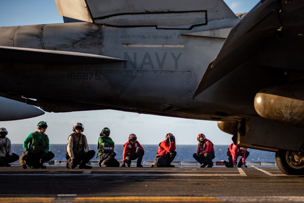 USS Ronald Reagan (CVN 76) conducts flight operations in support of Multi-Large Deck Exercise with USS Carl Vinson (CVN 70) and Japanese Maritime Self-Defense Force Hyuga-class helicopter destroyer JS Hyuga (DDH 181)