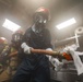 Sailors aboard USS Shoup participate in firefighting drill