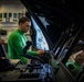 HSC-23 Airman Performs Maintenance on Helicopter