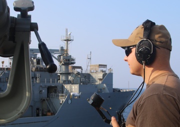 USS McFaul Conducts Replenishment-at-Sea with USNS Alan Shepard