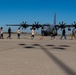 Spouses of members of the 182nd Operations Group fly on a C-130H3