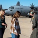 Spouses of members of the 182nd Operations Group fly on a C-130H3