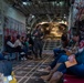 Spouses of members of the 182nd Operations Group fly on a C-130H3