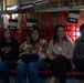 Spouses of members of the 182nd Operations Group fly on a C-130H3