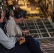 Spouses of members of the 182nd Operations Group fly on a C-130H3