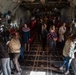 Spouses of members of the 182nd Operations Group fly on a C-130H3