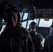 Spouses of members of the 182nd Operations Group fly on a C-130H3