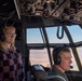 Spouses of members of the 182nd Operations Group fly on a C-130H3