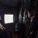 Spouses of members of the 182nd Operations Group fly on a C-130H3