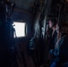 Spouses of members of the 182nd Operations Group fly on a C-130H3