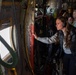 Spouses of members of the 182nd Operations Group fly on a C-130H3