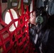 Spouses of members of the 182nd Operations Group fly on a C-130H3