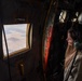 Spouses of members of the 182nd Operations Group fly on a C-130H3