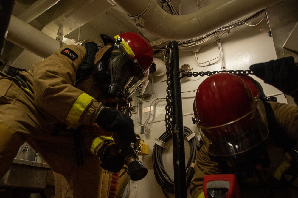 USS Ronald Reagan (CVN 76) Sailors conduct In-port Emergency Team drills