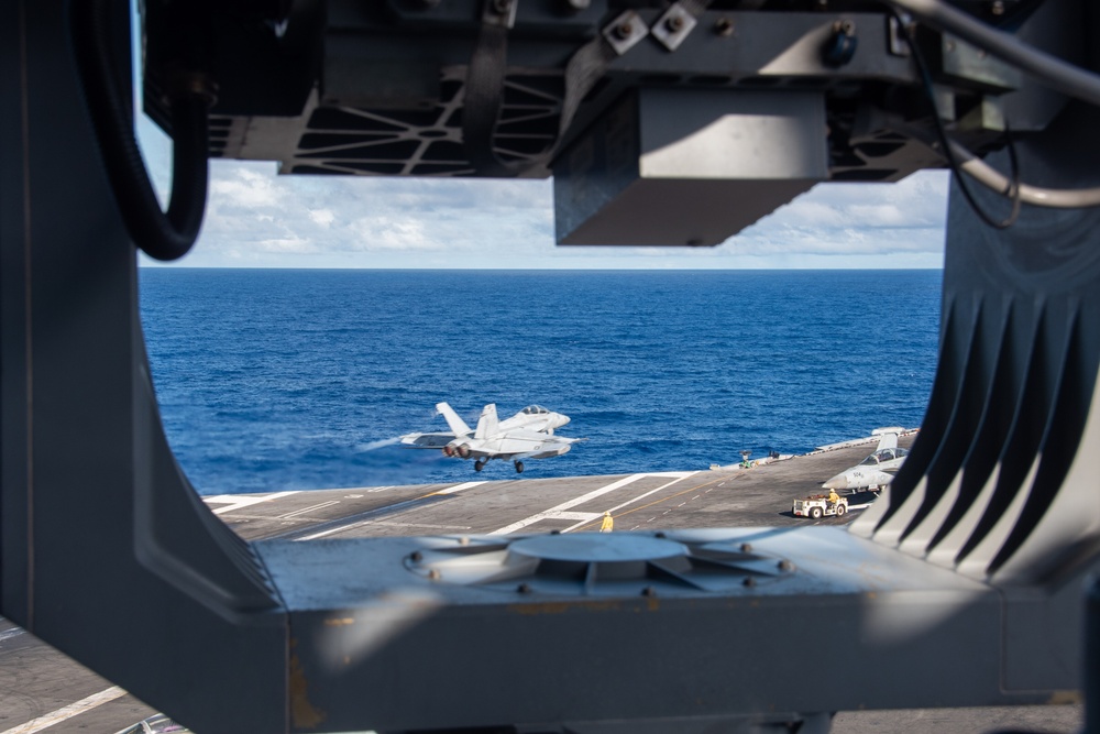 USS Ronald Reagan (CVN 76) conducts flight operations in support of Multi-Large Deck Exercise with USS Carl Vinson (CVN 70) and Japanese Maritime Self-Defense Force Hyuga-class helicopter destroyer JS Hyuga (DDH 181)