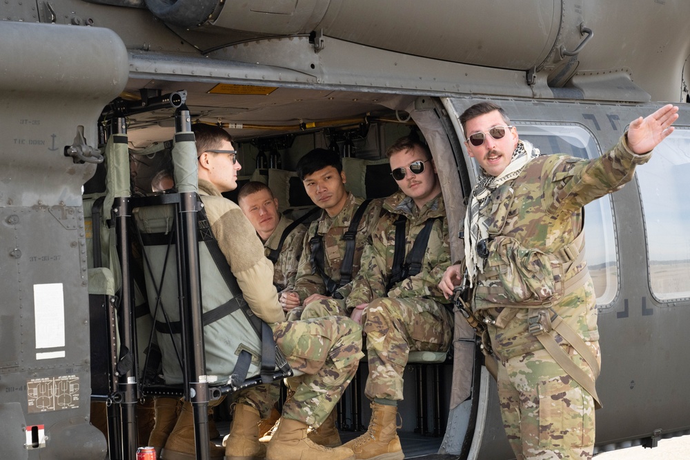 Airmen ride in Black Hawk for morale, training event