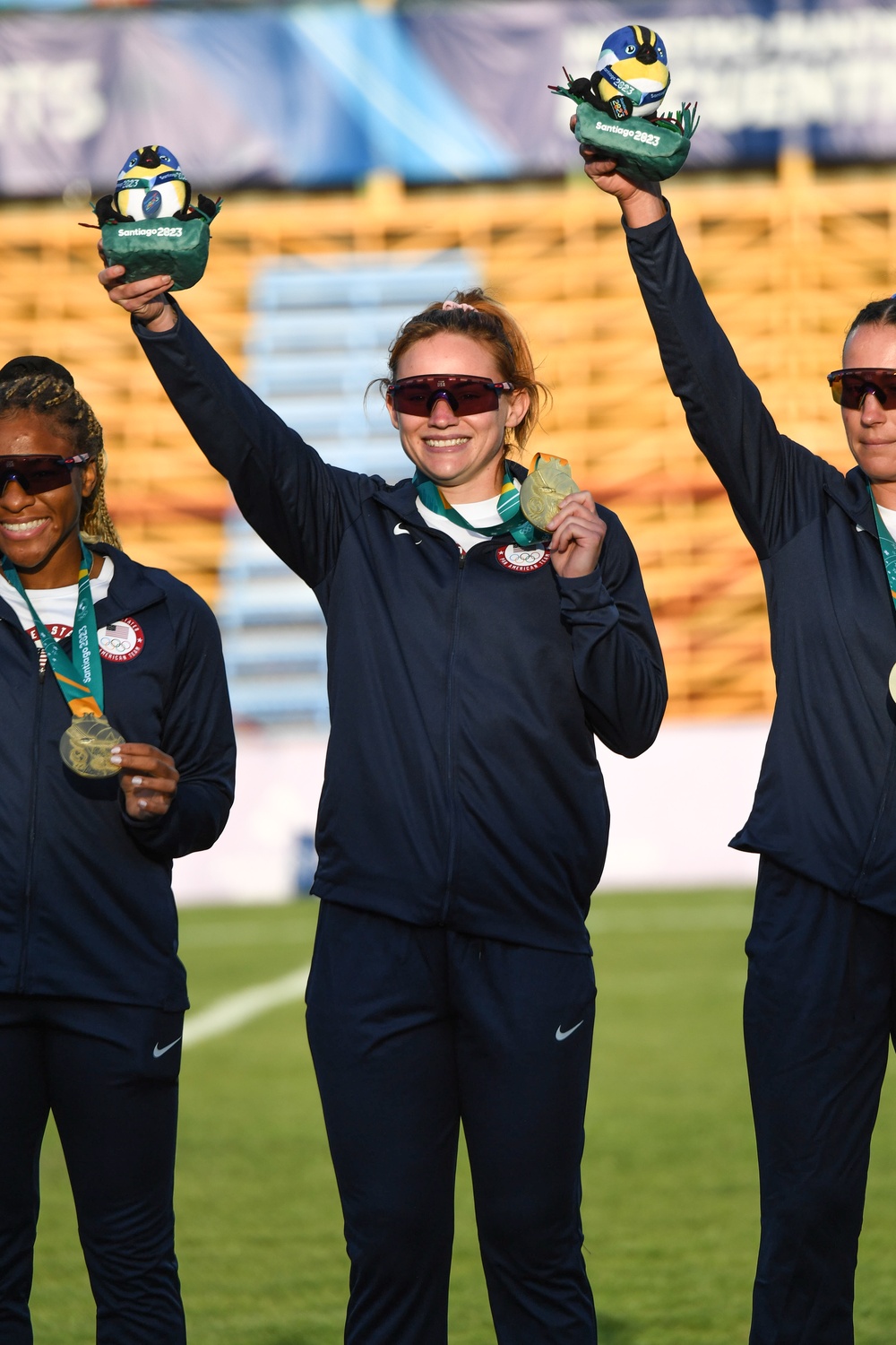 1st Lt. Sam Sullivan and Sgt. Joanne Fa'avesi help the U.S. Women's Rugby 7s team win the gold medal at the Pan American Games