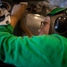 USS Carl Vinson (CVN 70) Sailors Conduct Maintenance In The Hangar Bay