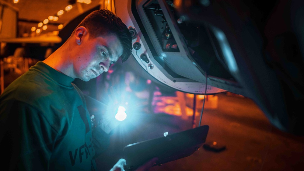 Sailor Conducts Radar Package Inspection Aboard USS Carl Vinson