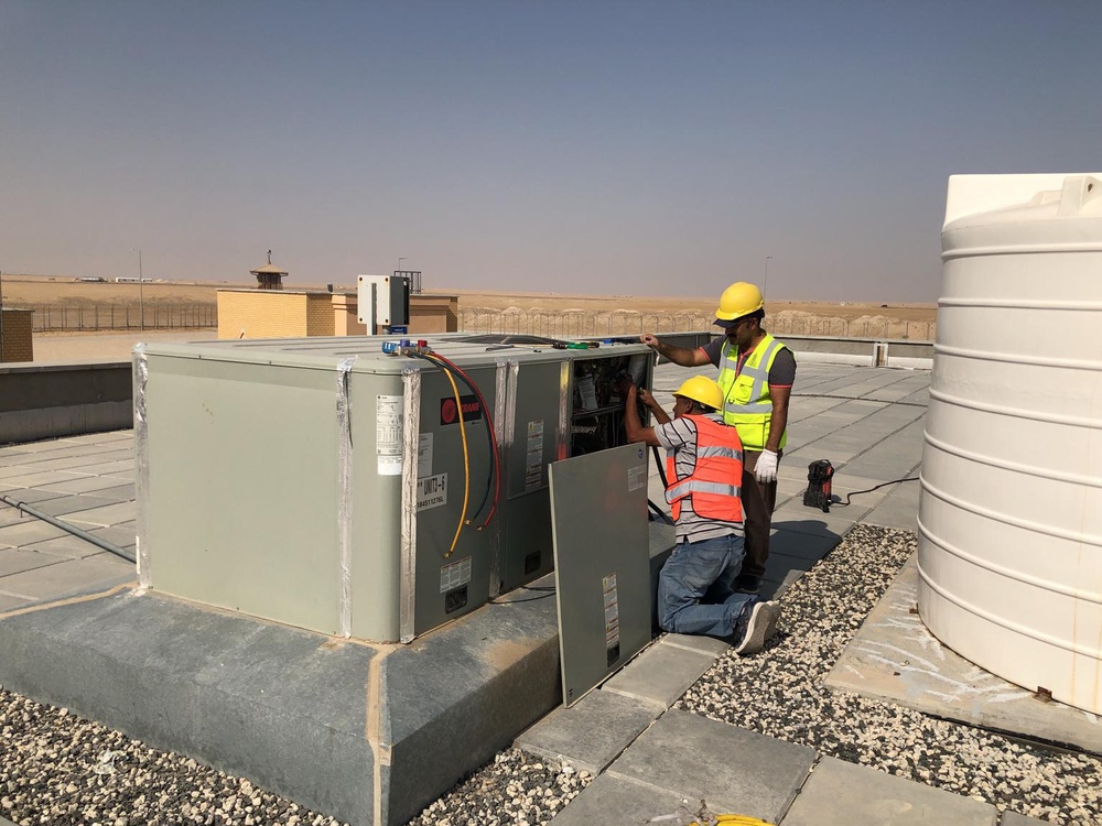 Contractors perform routine operations and maintenance work for the U.S. Army Corps of Engineers Transatlantic Middle East District.