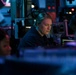 Sailors aboard USS Shoup stand watch in combat information center