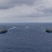 Ronald Reagan and Carl Vinson Carrier Strike Groups steam in formation with Japan Maritime Self-Defense Force (JMSDF) first-in-class helicopter destroyer JS Hyuga (DDH 181) during Multi-Large Deck Exercise