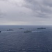 Ronald Reagan and Carl Vinson Carrier Strike Groups steam in formation with Japan Maritime Self-Defense Force (JMSDF) first-in-class helicopter destroyer JS Hyuga (DDH 181) during Multi-Large Deck Exercise