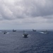 Ronald Reagan and Carl Vinson Carrier Strike Groups steam in formation with Japan Maritime Self-Defense Force (JMSDF) first-in-class helicopter destroyer JS Hyuga (DDH 181) during Multi-Large Deck Exercise