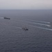 Ronald Reagan and Carl Vinson Carrier Strike Groups steam in formation with Japan Maritime Self-Defense Force (JMSDF) first-in-class helicopter destroyer JS Hyuga (DDH 181) during Multi-Large Deck Exercise