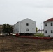 World War II-era barracks rolls to its new foundation at Fort McCoy