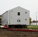 World War II-era barracks rolls to its new foundation at Fort McCoy