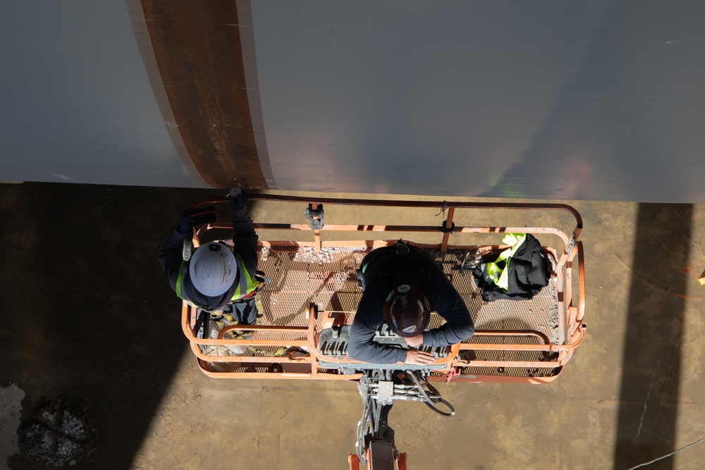 Welders working on the Fargo-Moorhead Metropolitan Area Flood Risk Management Project