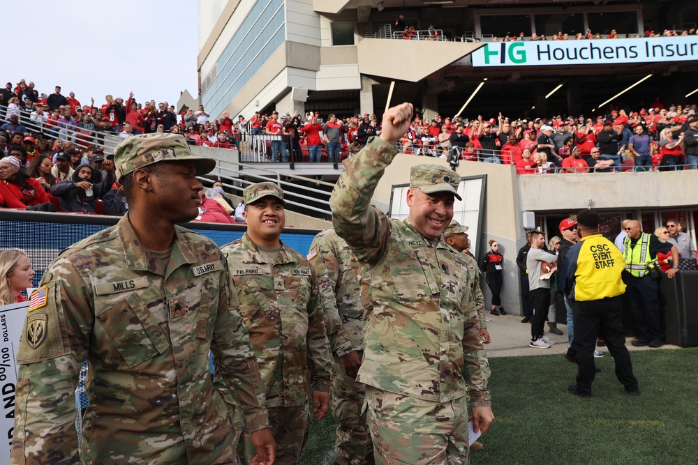 1st TSC Soldiers reenlist during Cardinal football’s ‘Salute to Service’ game