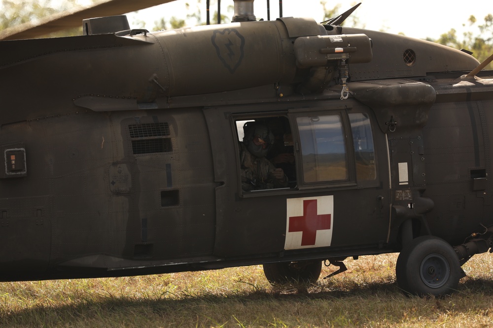 U.S. Army Soldiers with 25th Infantry Division participate in a rehearsal medical evacuation during JPMRC 24-01