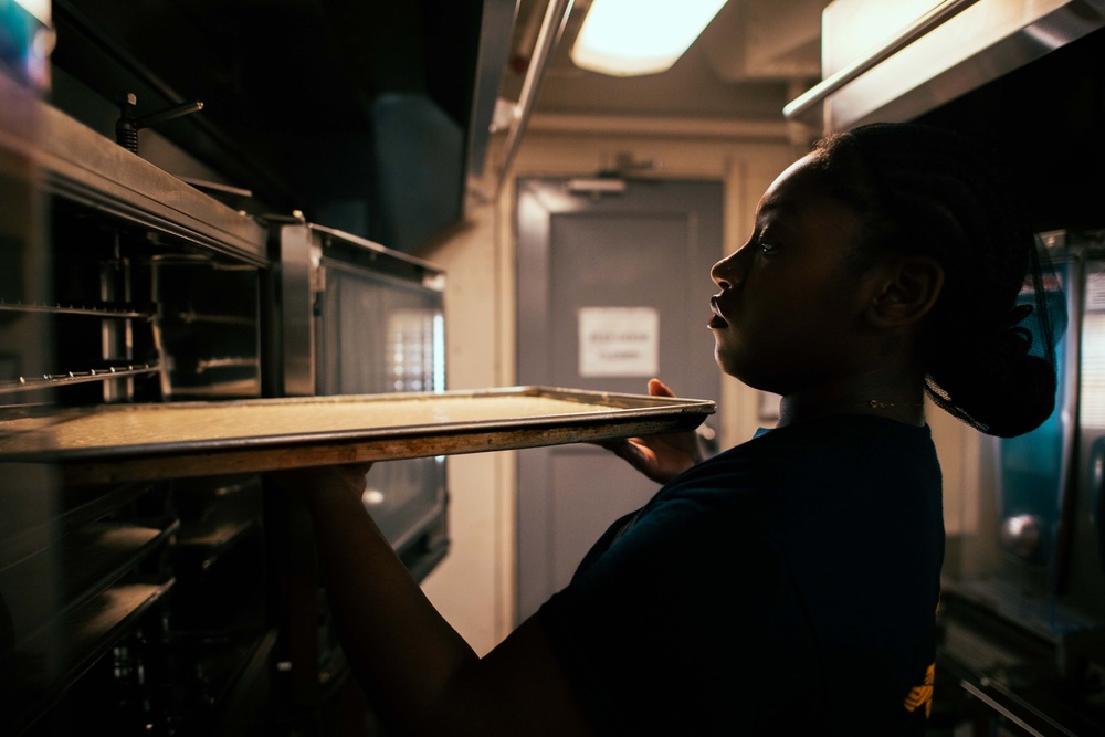 Sailor bakes aboard USS Carl Vinson