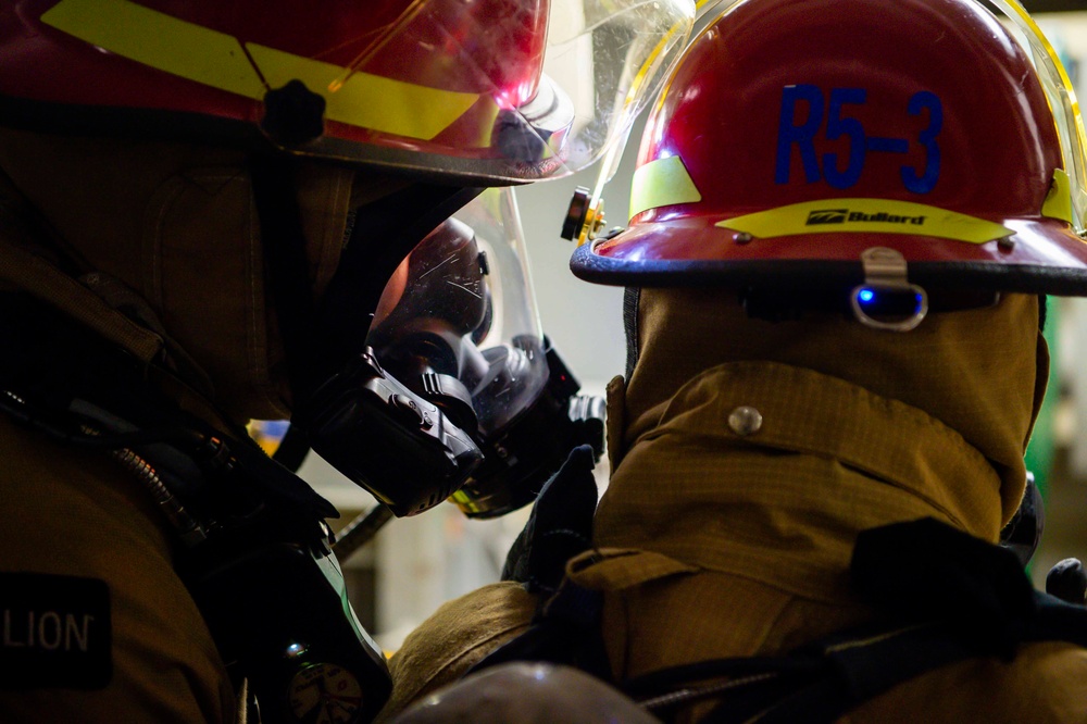 USS Kidd (DDG 100) Sailors Participate In Damage Control Drill