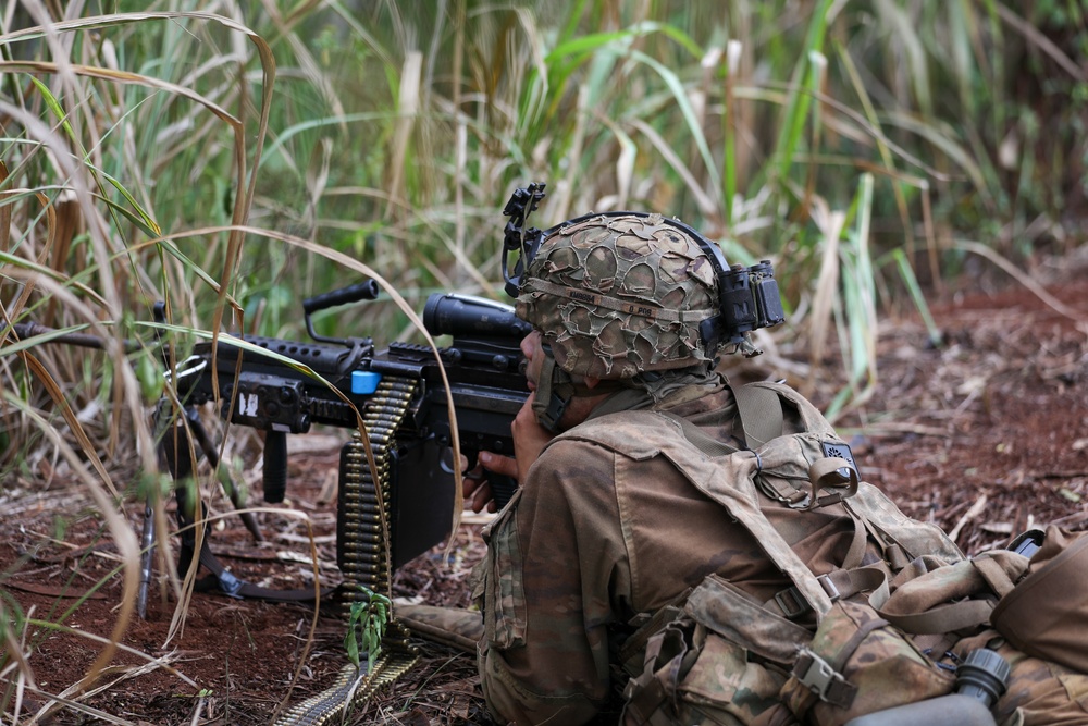 25th Infantry Division Soldiers participate in an assault on South Range during JPMRC 24-01