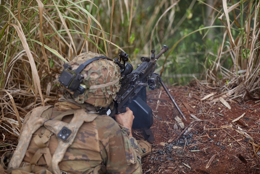 25th Infantry Division Soldiers participate in an assault on South Range during JPMRC 24-01