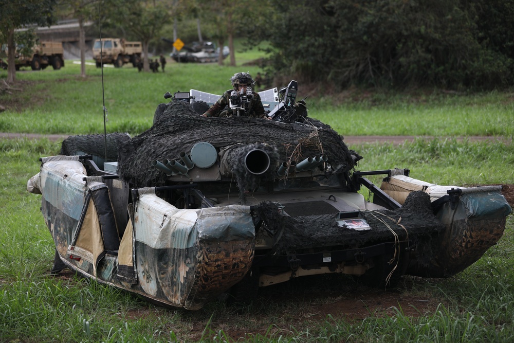 25th Infantry Division Soldiers participate in an assault on South Range during JPMRC 24-01