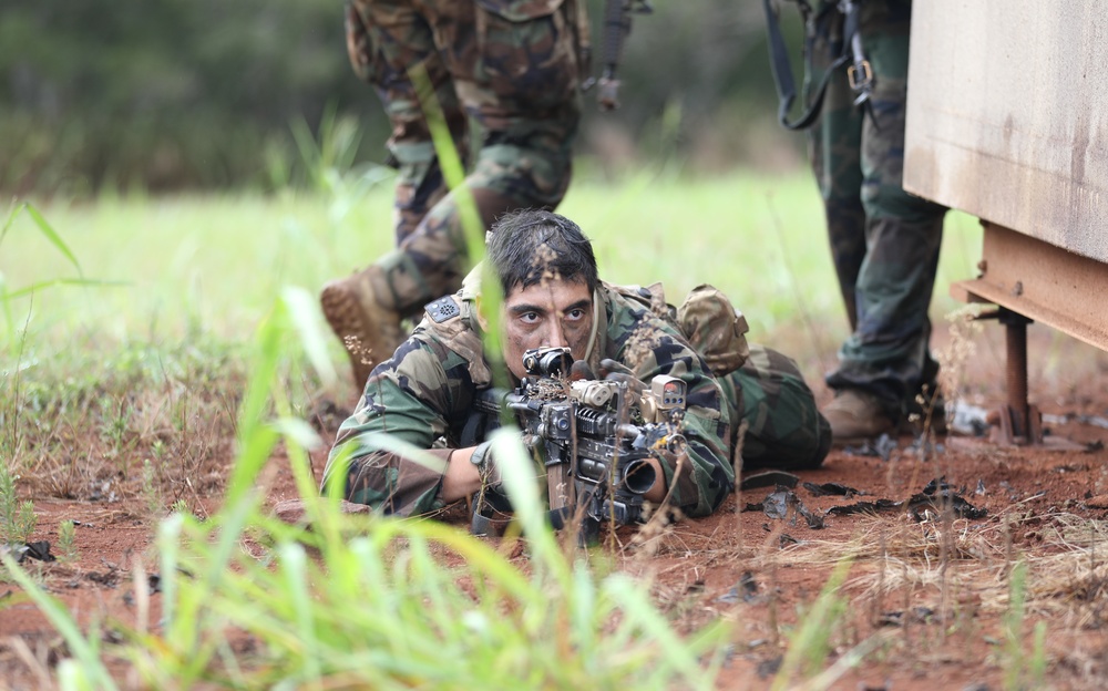 25th Infantry Division Soldiers participate in an assault on South Range during JPMRC 24-01