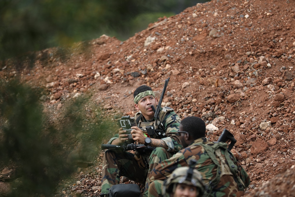 25th Infantry Division Soldiers participate in an assault on South Range during JPMRC 24-01