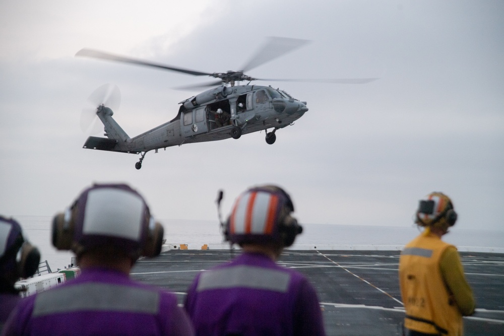 USS San Diego (LPD 22) recovers helicopter